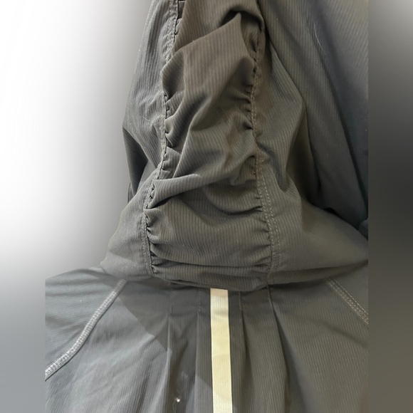 Lucy Black Jacket with Orange Brand Tag size large - Picture 3 of 8